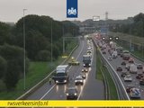 Flinke vertraging op A15 door defecte vrachtwagen